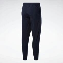Reebok Pantalón Training Essentials Woven Cuffed -Senderismo Ropa Tienda pantalon training essentials woven cuffed 2